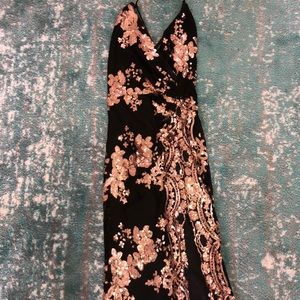 Form fitting dress w/ leg slit & criss cross back